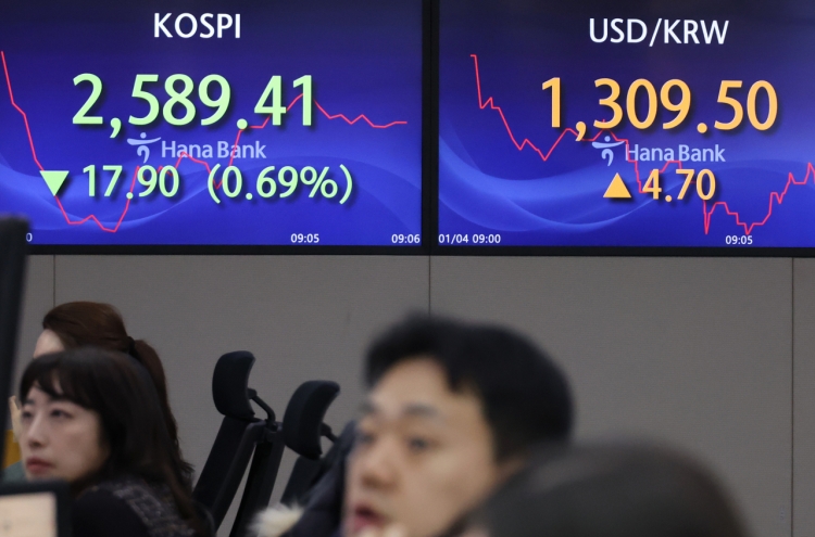 Seoul shares open lower after Fed minutes