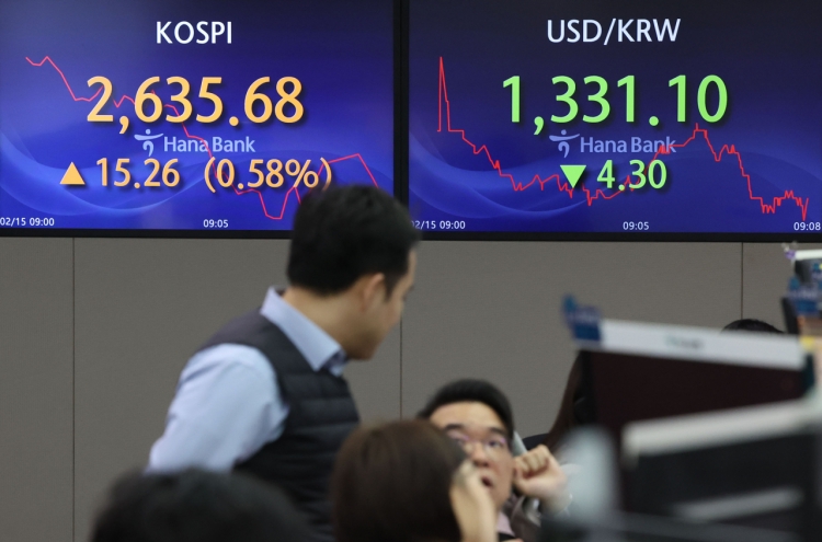 Seoul shares open higher on US gains