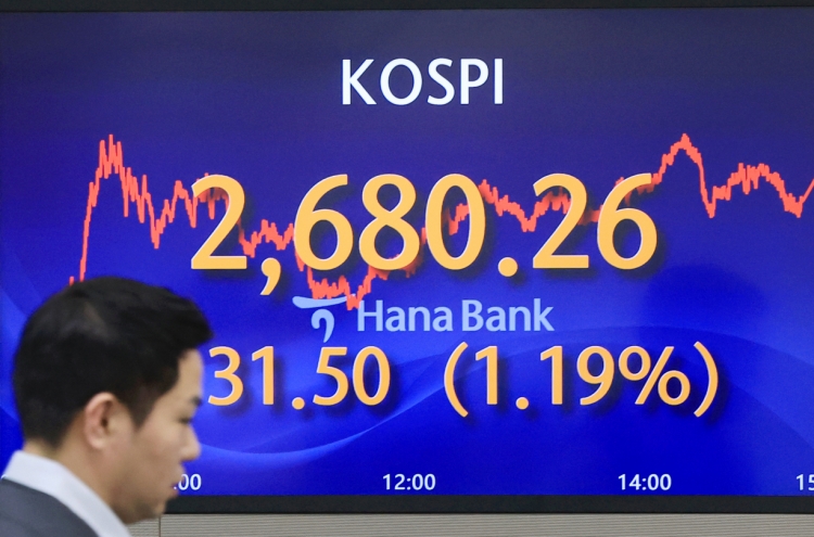 Seoul shares spike over 1% on foreign buying binge