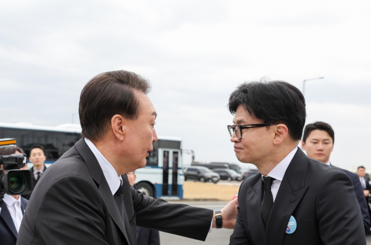 Yoon, PPP chief look around salvaged warship together after reported clash