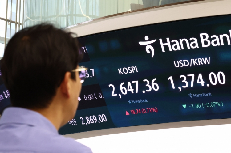 Seoul shares open higher on tech, financial gains
