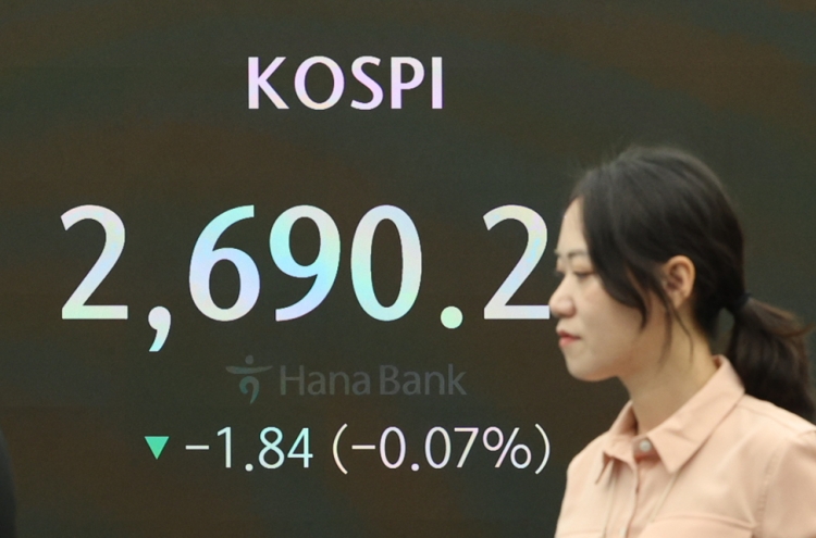 Seoul shares open lower on Fed's rate freeze