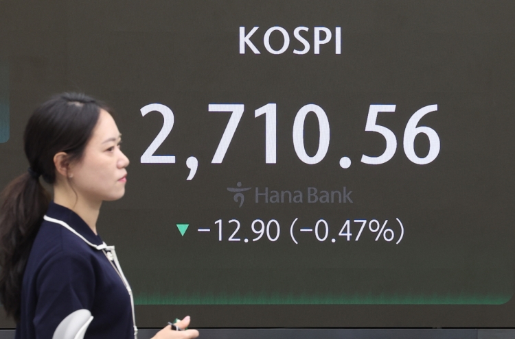Seoul shares open lower on Fed minutes