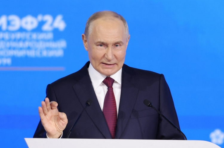 Putin calls for major expansion of Russian financial markets, cutting use of Western currencies