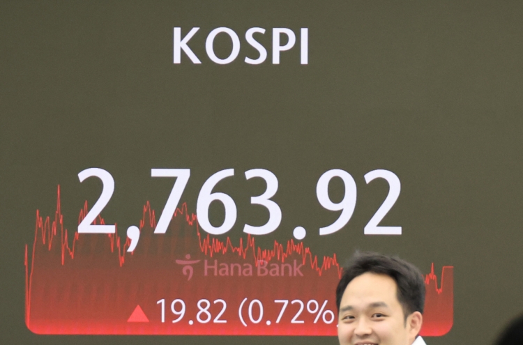 Seoul shares hit over 2-yr high on strong foreign buying