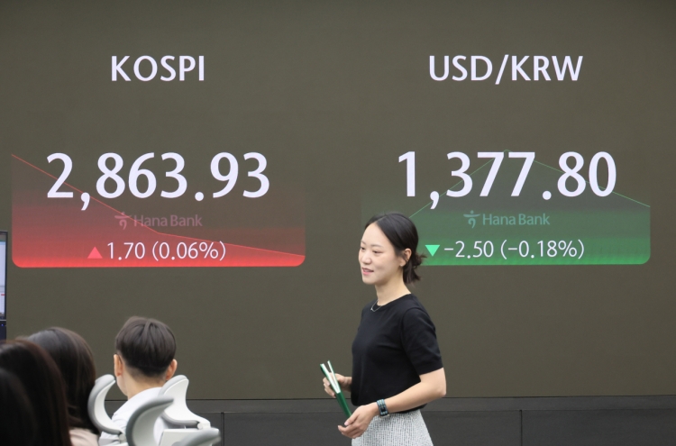 Seoul shares open tad higher on US rate-cut hopes