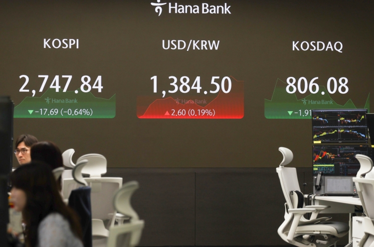 Seoul shares open lower ahead of Fed rate decision, earnings