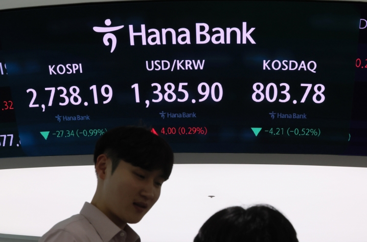 Seoul shares end nearly 1% lower ahead of Fed meeting, major earnings releases