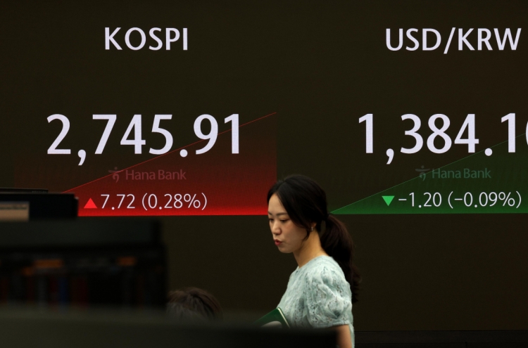 Seoul shares open higher on rate cut hopes