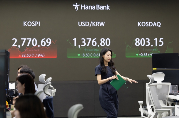 Seoul shares spike over 1% on tech gains amid rate cut hopes