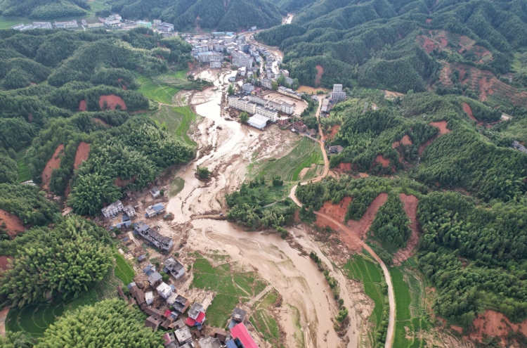 At least two dead after landslides in southwest China