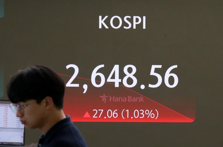 Seoul shares open higher on Wall Street gains