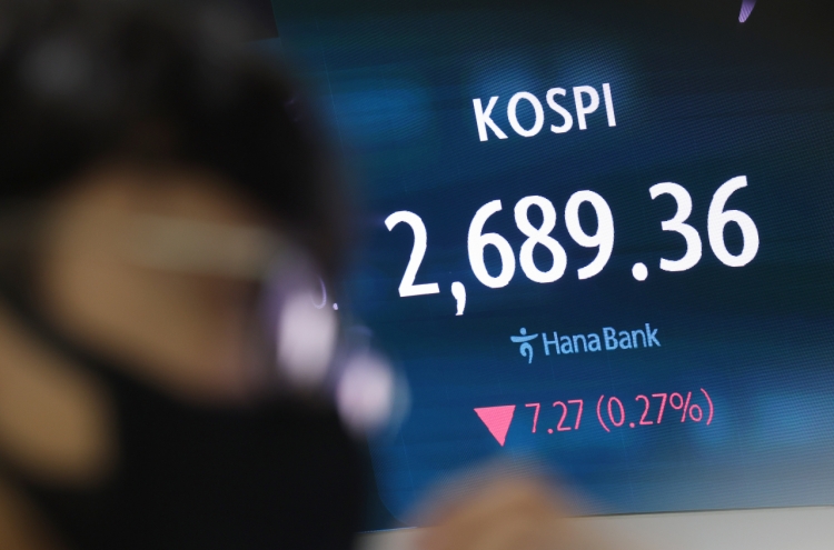 Seoul shares open lower on Wall Street losses