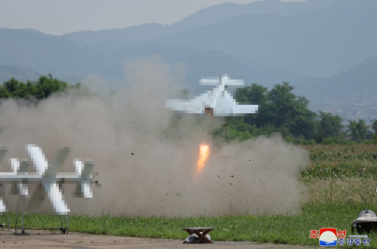 N. Korean leader oversees suicide drones test, calls for more production