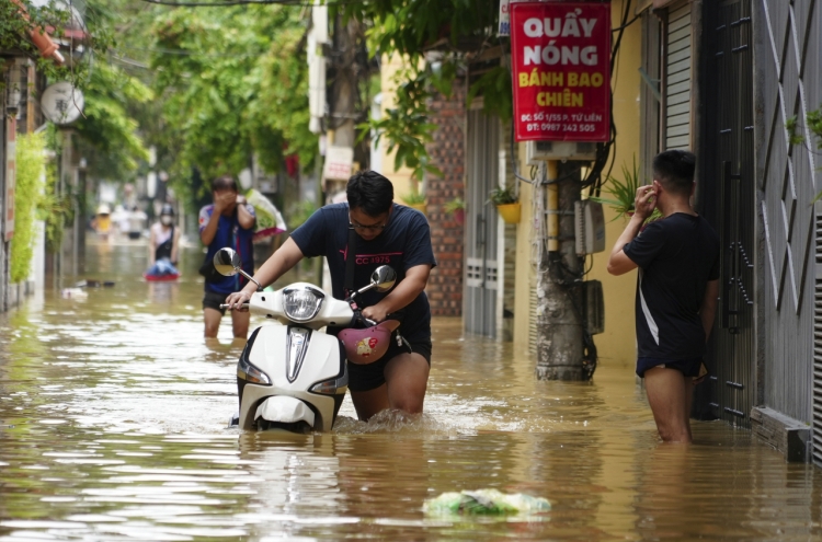 Vietnam typhoon death toll rises to 233 as more bodies found in areas hit by landslides and floods