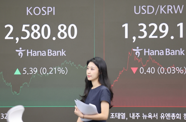 Seoul shares end higher after Fed's rate cut