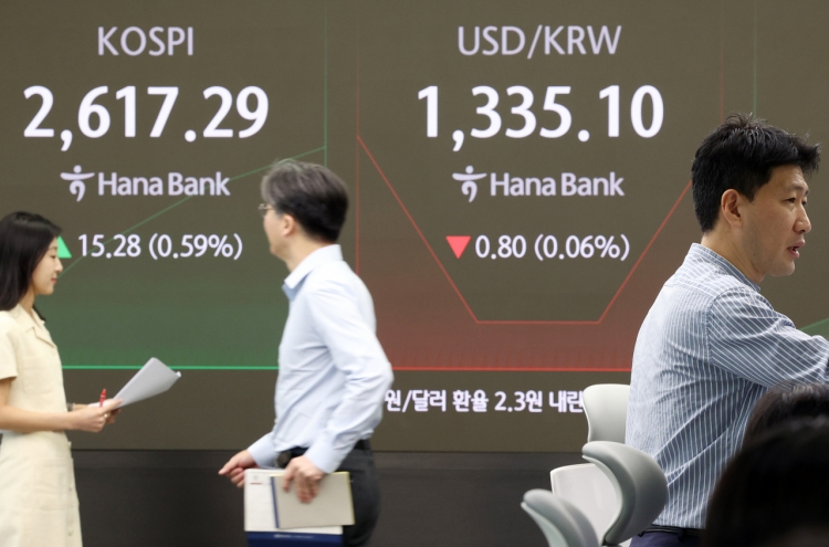 Seoul shares open higher on US gains