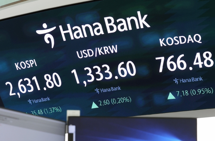 Seoul shares open higher on rate cut hopes