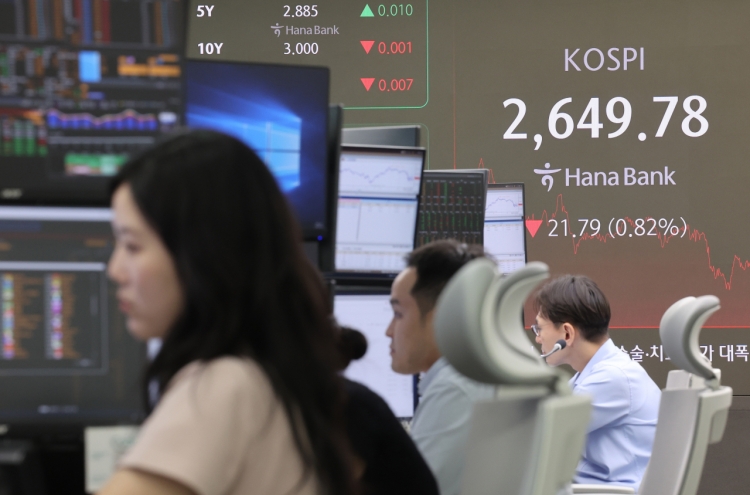 Seoul shares close lower on profit taking despite US gains