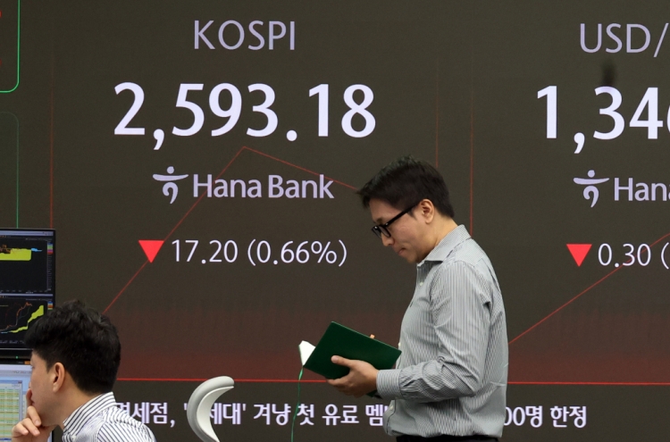 Seoul shares open lower over weak Samsung earnings, US losses