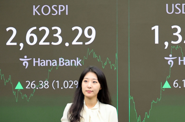 Seoul shares jump over 1% on tech gains, foreign buying