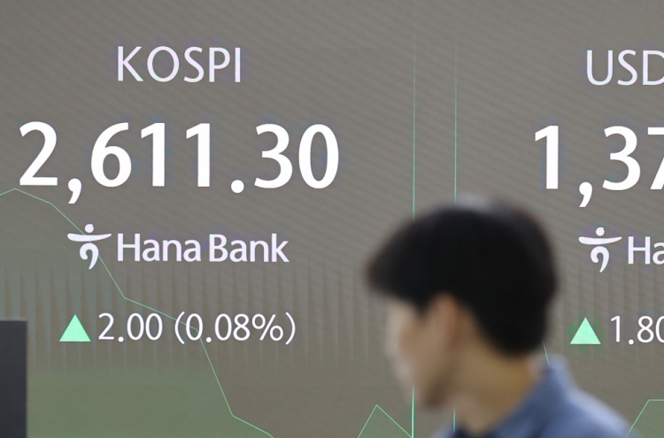 Seoul shares open higher on Wall Street gains