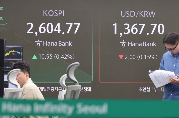 Seoul shares open higher on Wall Street gains