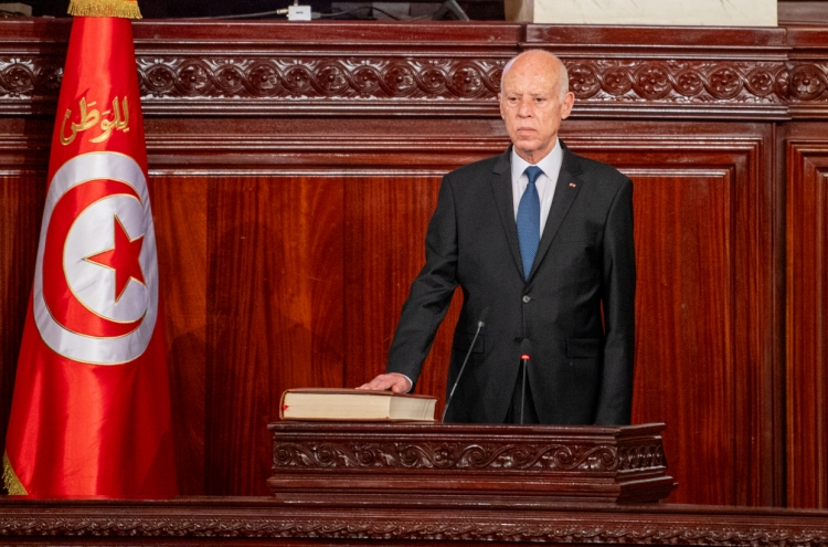 Tunisia's president is inaugurated for a second term following a crackdown on his opponents