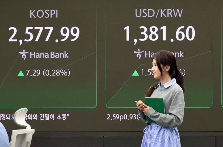 Seoul shares open higher on retail buying