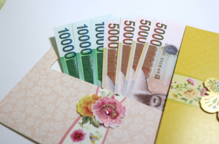 Average cash gift at weddings hits 90,000 won