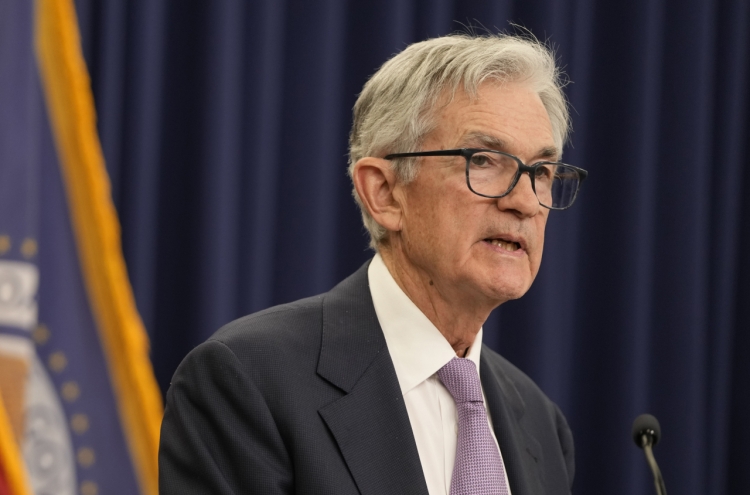 US Fed cuts key lending rate by quarter-percentage point