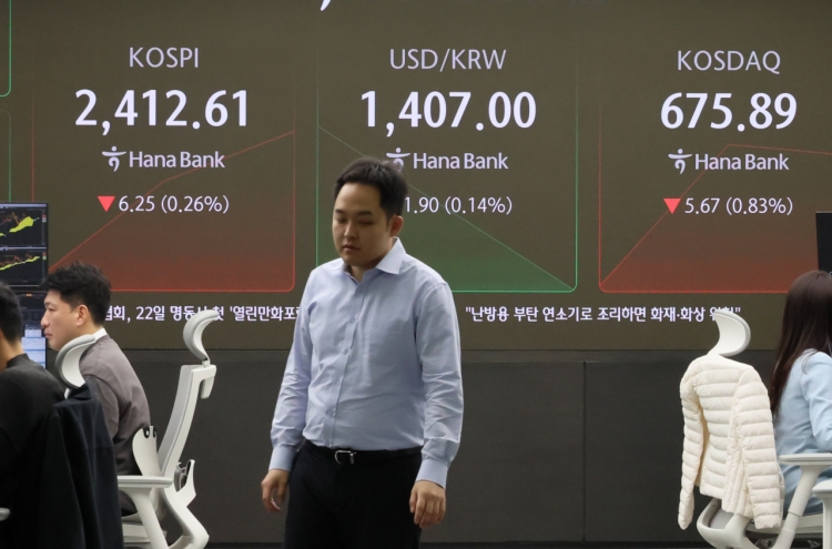 Seoul shares open lower as Fed hints at slowing rate cut