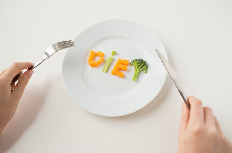 Diet, exercise top Korea's year-end resolutions: survey