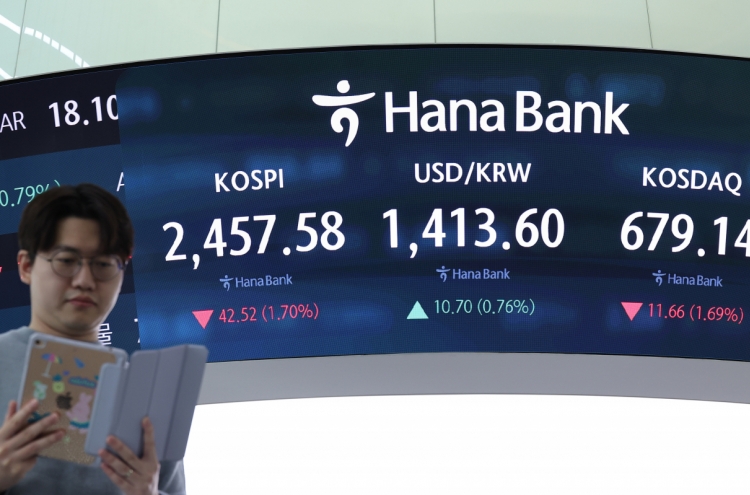 Seoul shares open lower after short-lived martial law attempt