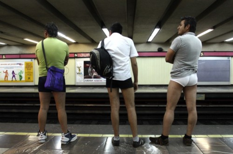 S. African police fine 'no pants' train passengers