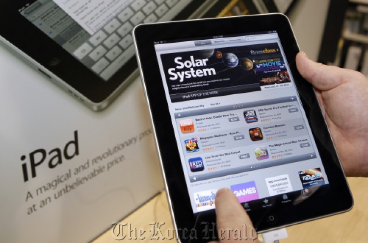 Companies splurging on iPads could be sign of recovery