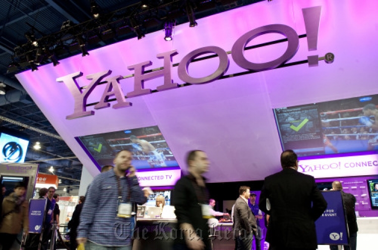 Yahoo’s earnings double despite ebbing revenue