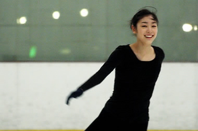 Kim Yu-na looks forward to world championships