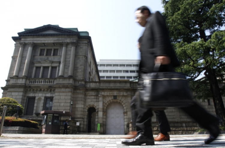Japan feeds more money to banks