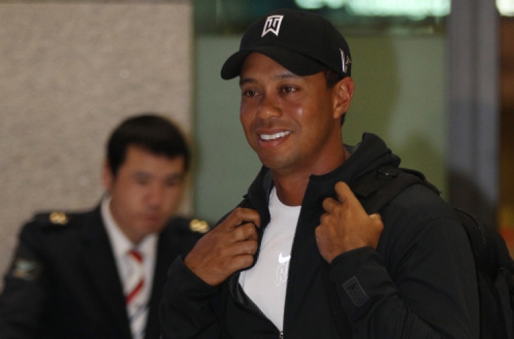 Tiger Woods returns to Korea for golf clinic