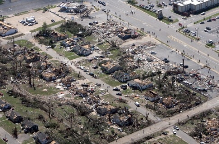 Tornadoes devastate US South, killing at least 280