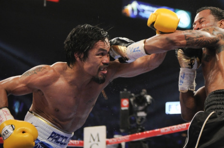 Pacquiao wins lopsided decision over Mosley