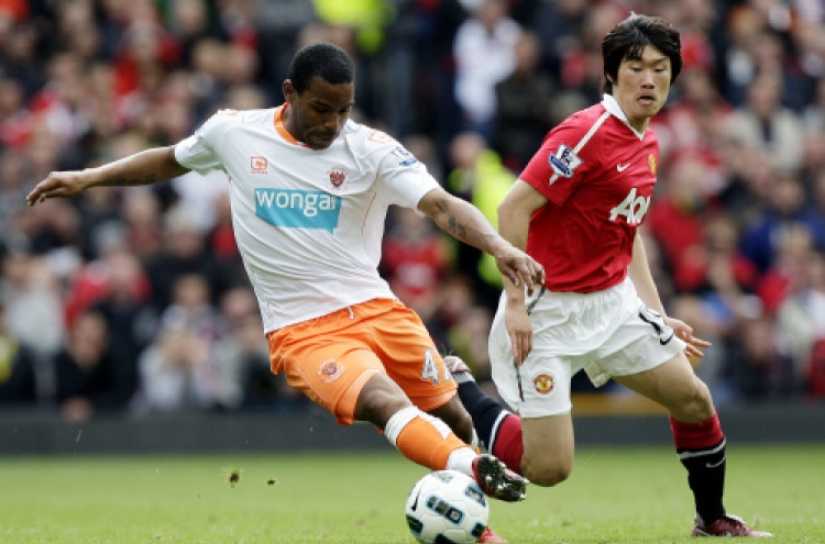 Blackpool relegated after 4-2 loss at Man United