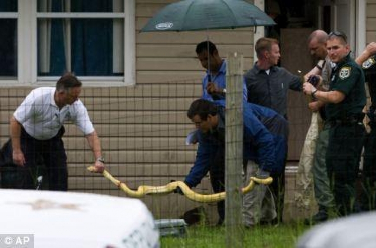 Parents on a trial as a pet python kills two-year-old daughter