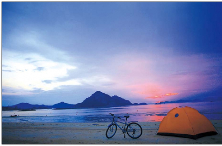 Ride bikes in red sunsets on Seonyu Island