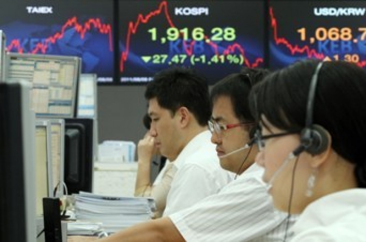 Seoul shares tumble on U.S. debt rate cut