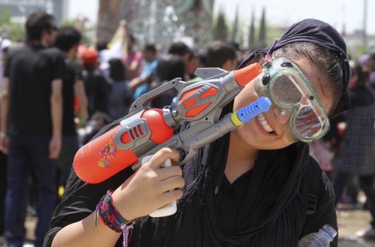 Water gun fight in a park? Iran sees dark designs