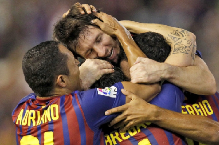 Barca rally to pull off draw at Valencia