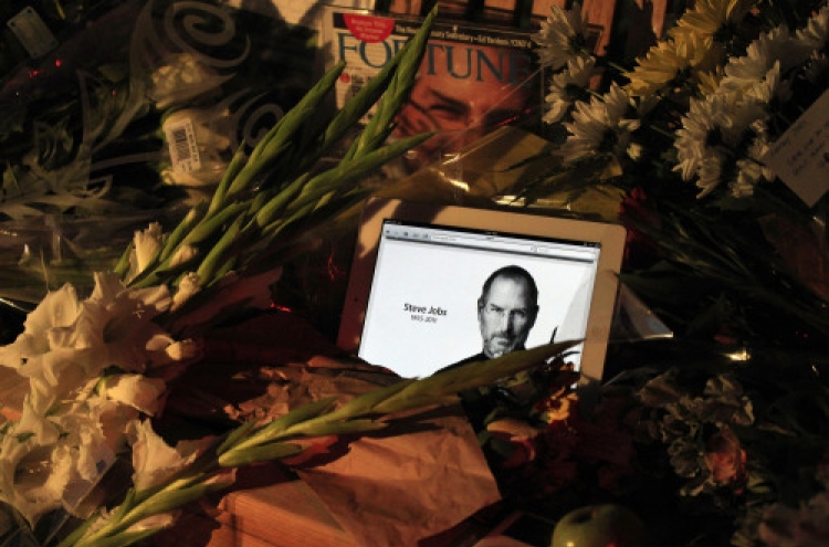 Apple's Steve Jobs, father of Mac, iPhone, dies