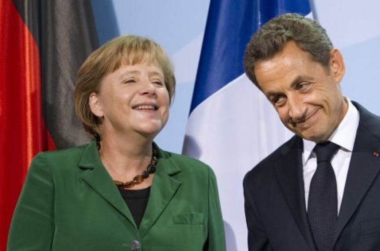 Merkel, Sarkozy reach agreement on bank sector